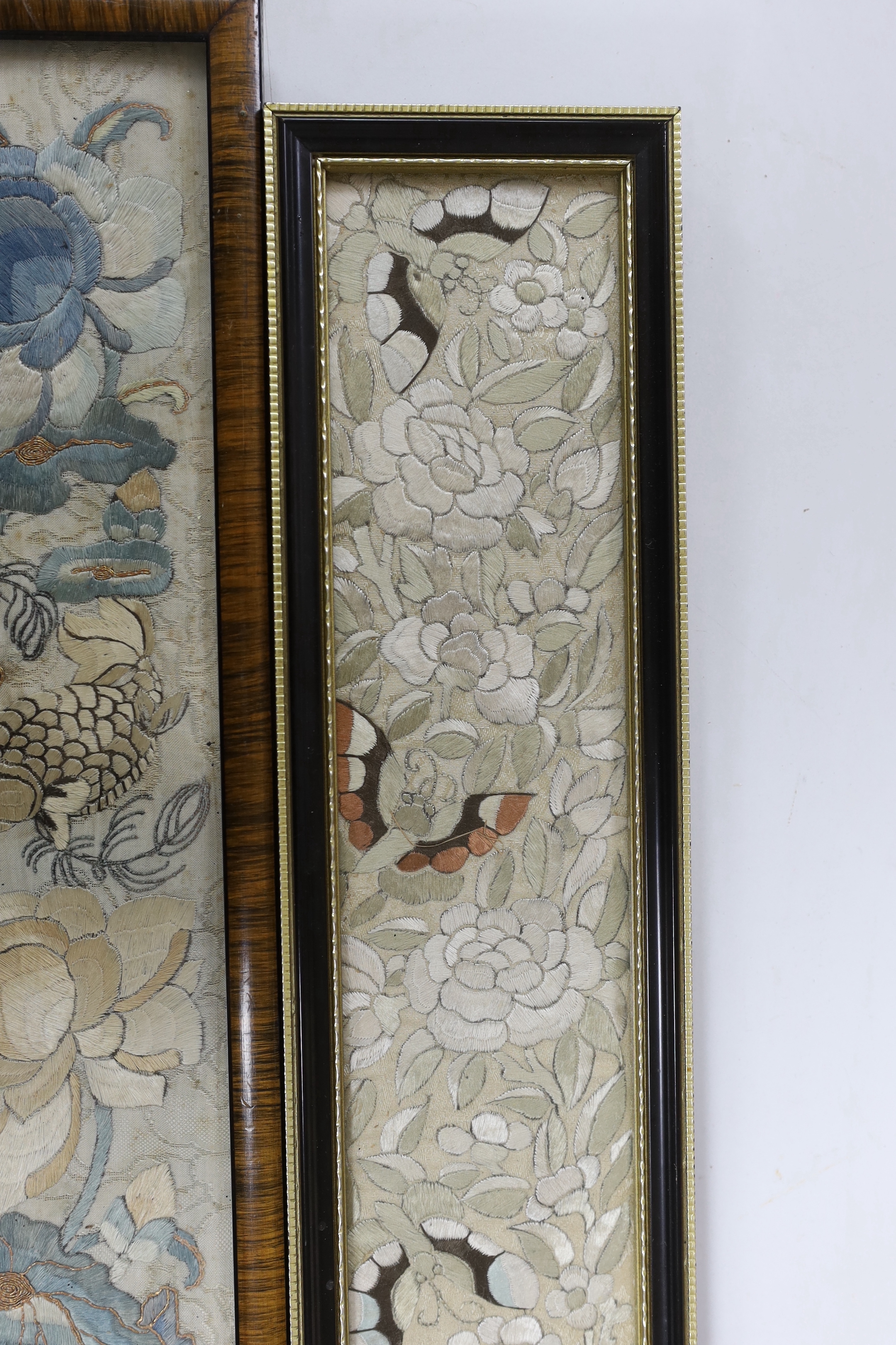 Three 19th century Chinese framed silk panels with embroidered decoration, largest 12 x 55cm